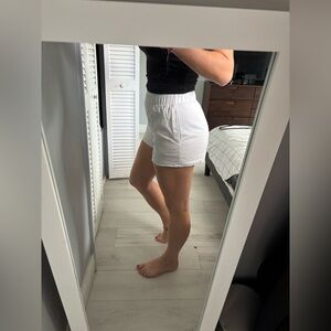 white fabric shorts